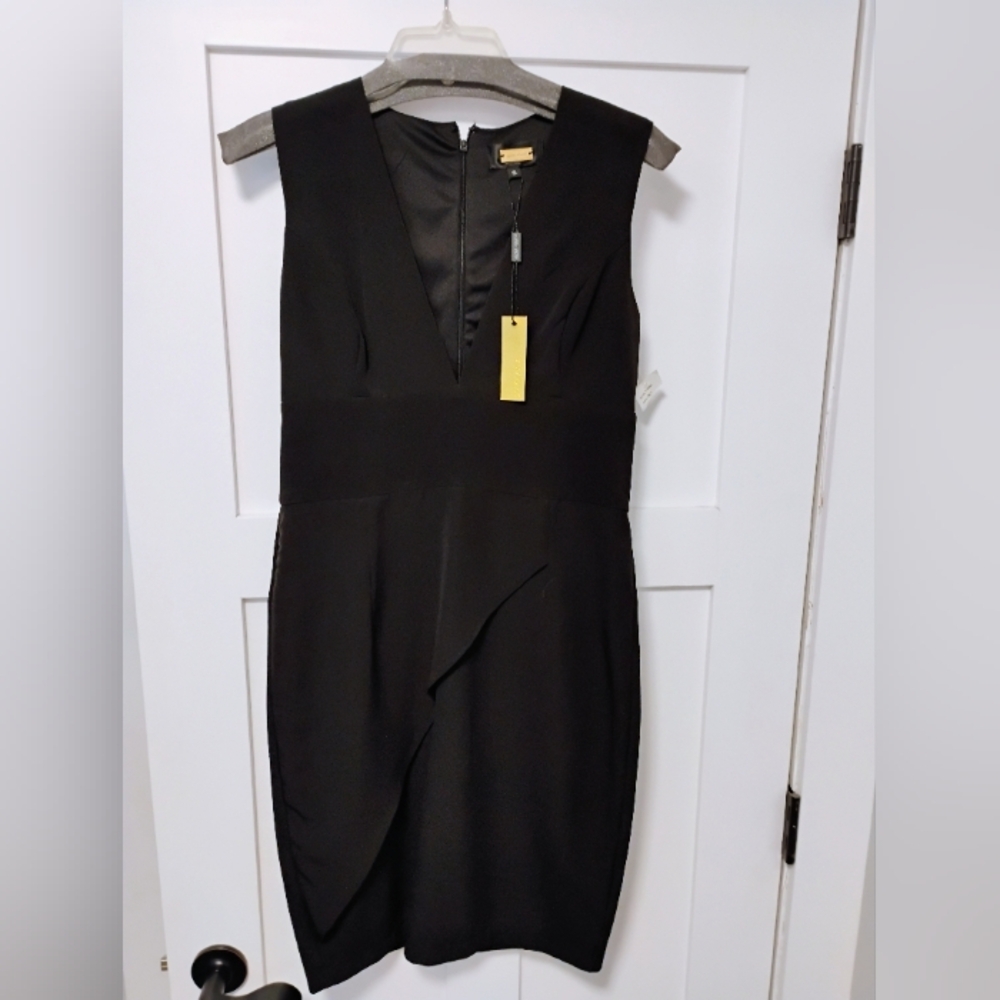 Black V-neck sleeveless midi sheath dress